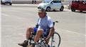 Fastest Time To Flip A 100-Kilogram Tire Three Kilometers And Ride A Wheelchair Three Kilometers