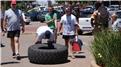 Fastest Time For Two People To Flip A 100-Kilogram Tire 2.5 Kilometers