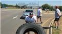 Fastest Time For Two People To Flip A 100-Kilogram Tire 2.5 Kilometers