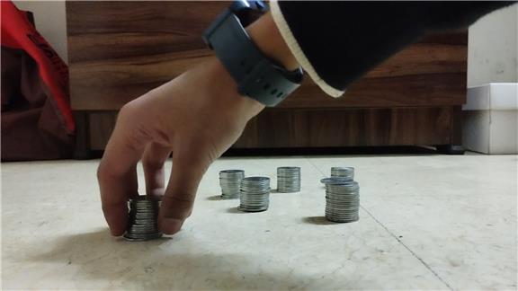 Tallest Stack of Coins