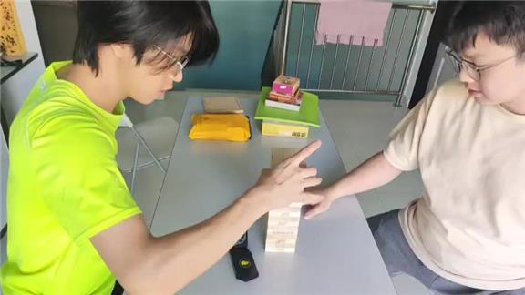 FASTEST TIME to REMOVE THREE LEVELS FROM a JENGA TOWER ONE-HANDED in ALTERNATING FASHION by a TEAM of TWO