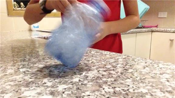 Most Water Bottle Flips Onto A Table In One Minute