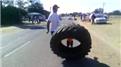 Fastest Time For A Father-Son Team To Flip An 85-Kilogram Tire 30 Times