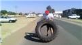 Fastest Time For A Father-Son Team To Flip An 85-Kilogram Tire 30 Times