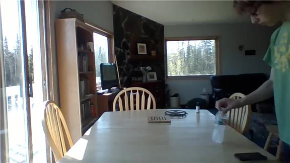 Most Water Bottle Flips Onto A Table In 15 Seconds