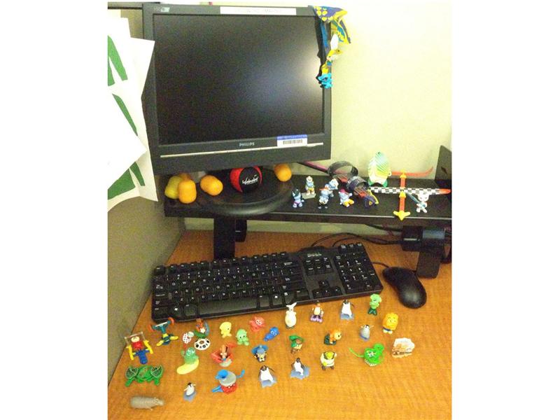 Most Kinder Egg Toys Displayed On A Desk