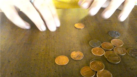 Most Coins Stacked Into Stairs in One Minute