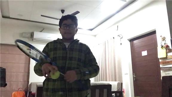 Most Tennis Ball Bounces On A Tennis Racquet By A 10-Year-Old