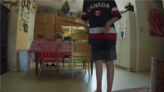 Longest Time Bouncing A Hockey Ball On A Hockey Stick While Kneeling