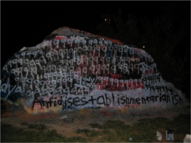 Most Images of \'9\' Spray Painted On A Rock