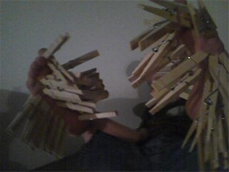 Most Clothespins Attached To Feet